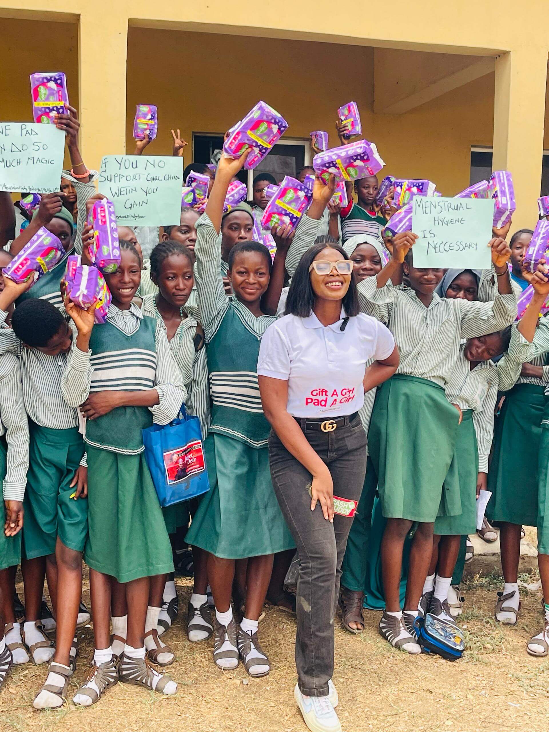 Girls celebrating receiving pads