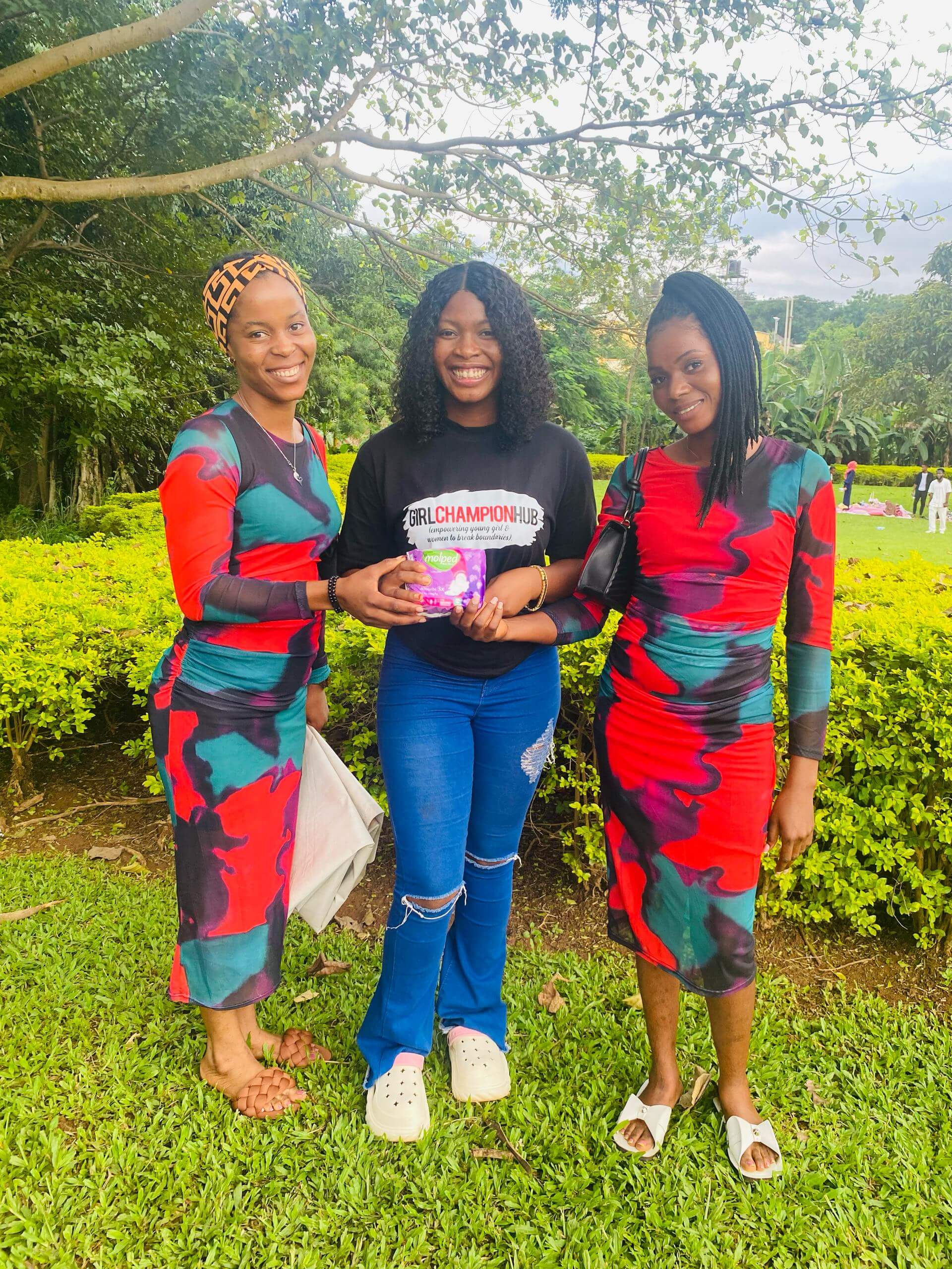 Team at outdoor event with girls